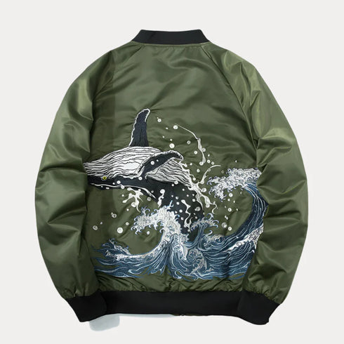 Embroidered green bomber baseball jacket with cartoon pattern design and rib sleeve cuffs.